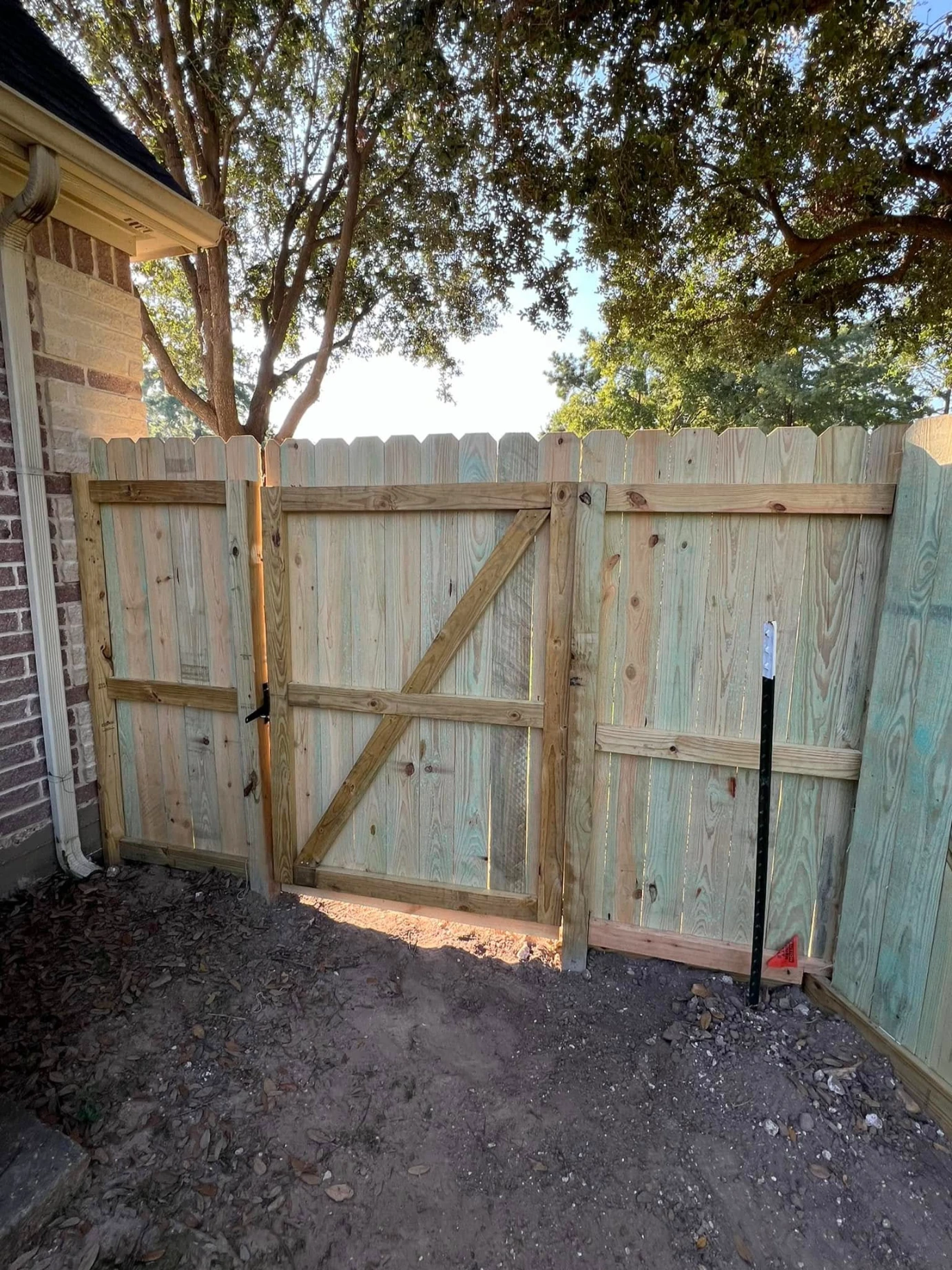 fence staining and repair services