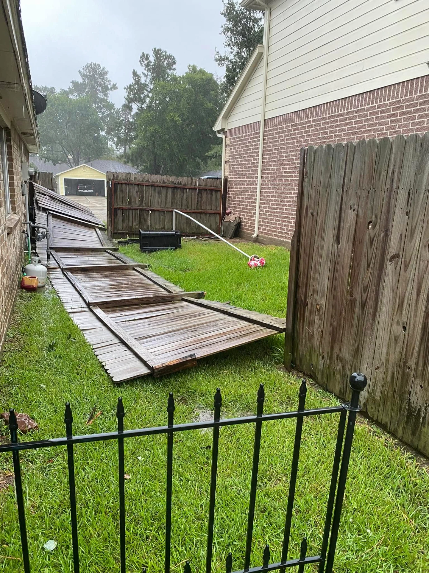 storm damaged fence repair
